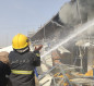 اخماد حريق في مجمع تجاري وسط بغداد