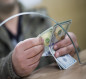انخفاض أسعار الدولار في العراق