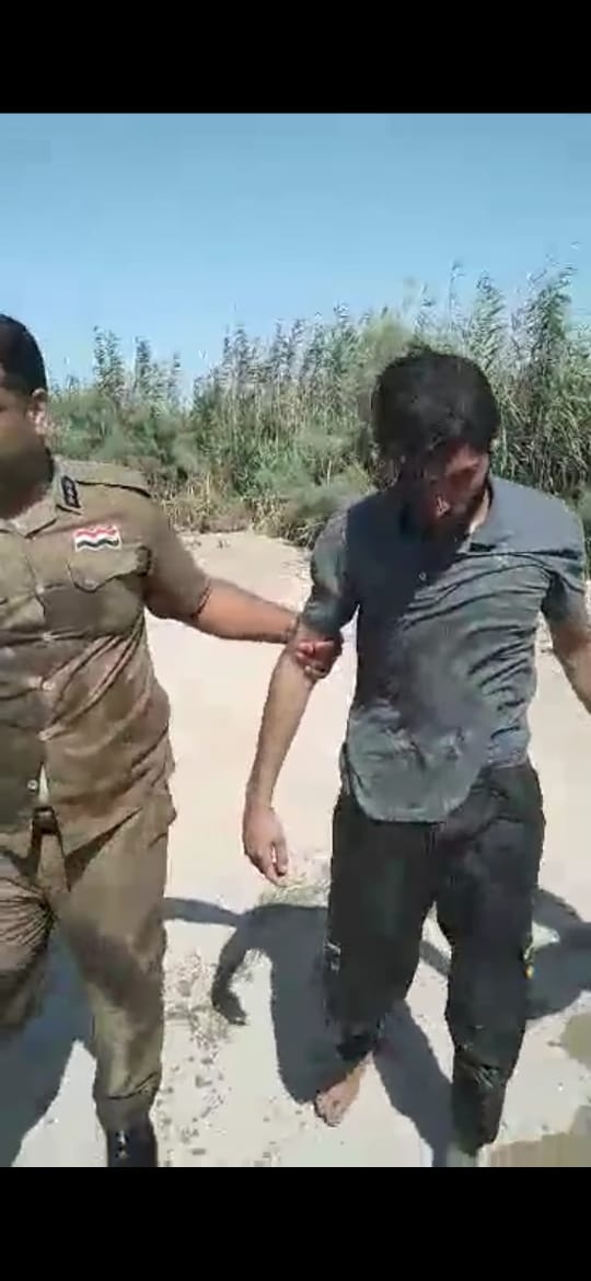 شرطة كربلاء تنقذ زائرا ايرانيا بعد سقوطه بأحد الأنهر (صور)