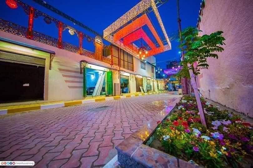 بالصور:تاهيل ازقة كربلاء القديمة بايادي فنيي العتبة الحسينية المقدسة