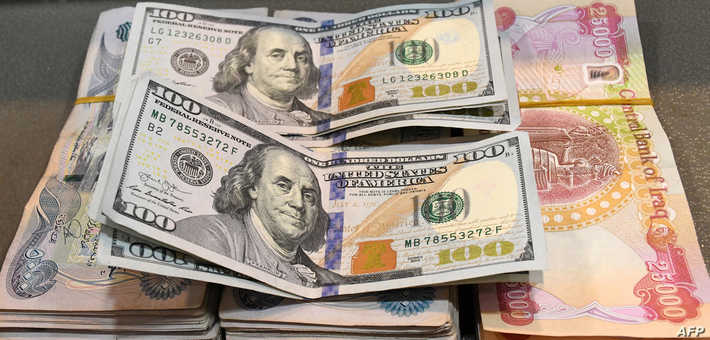 موقع أمريكي يحذر من رفع قيمة الدينار العراقي